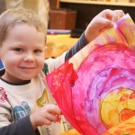 Young boy with painting